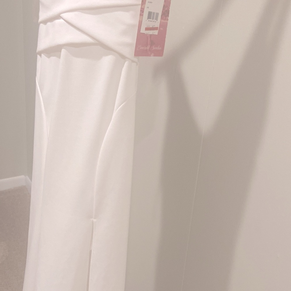 Beautiful white dress I never used .